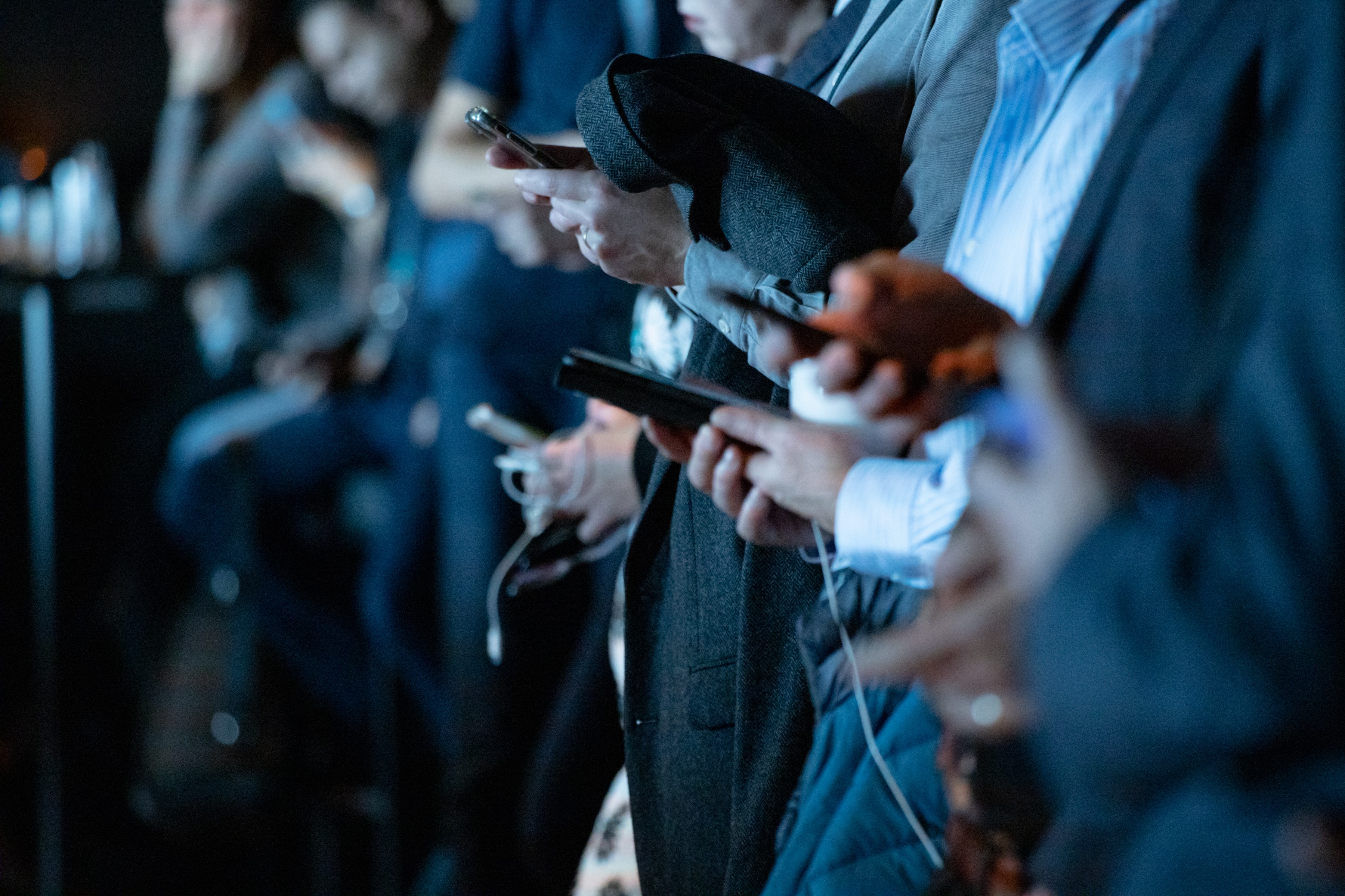 Image of workers on phones
