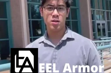 Student speaking in front of engineering building about startup, Eel Armor.