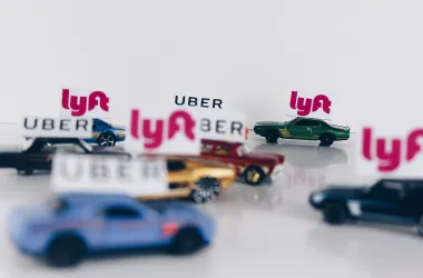 Toy cars labeled with Lyft and Uber