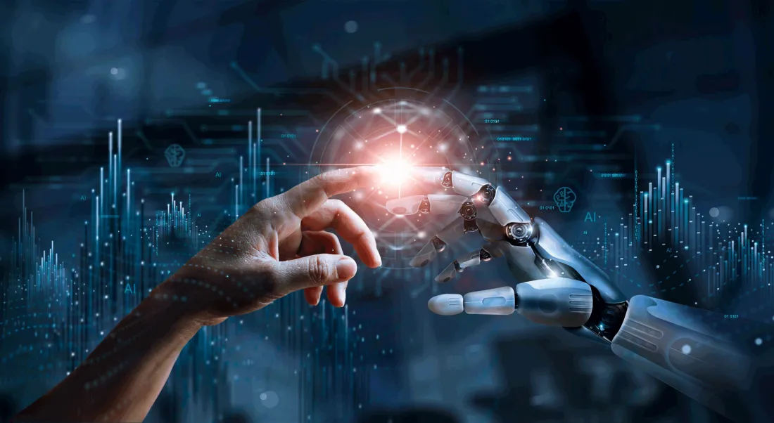Image of human and robotic hands touching