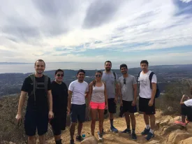 photo of the mtm group posing on the top of a hill