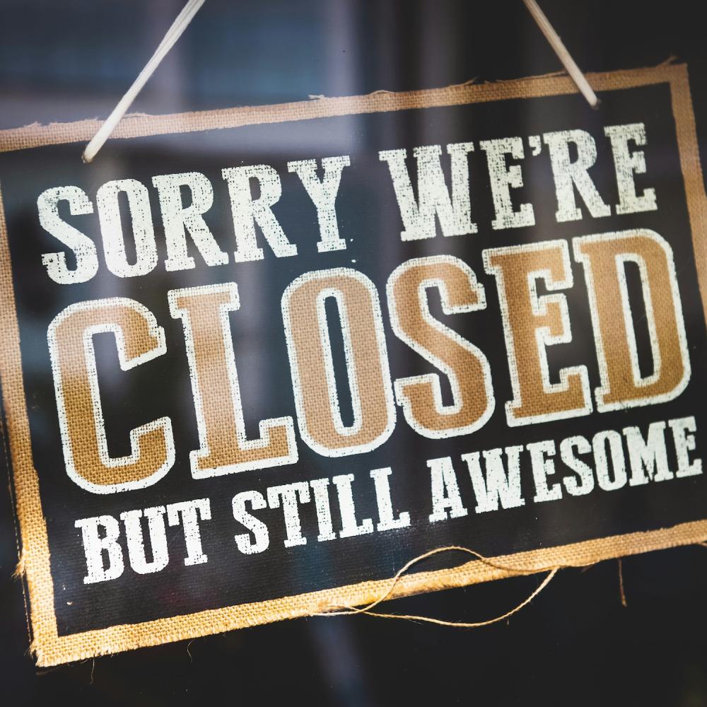 Sign stating "sorry, we're closed but still awesome"