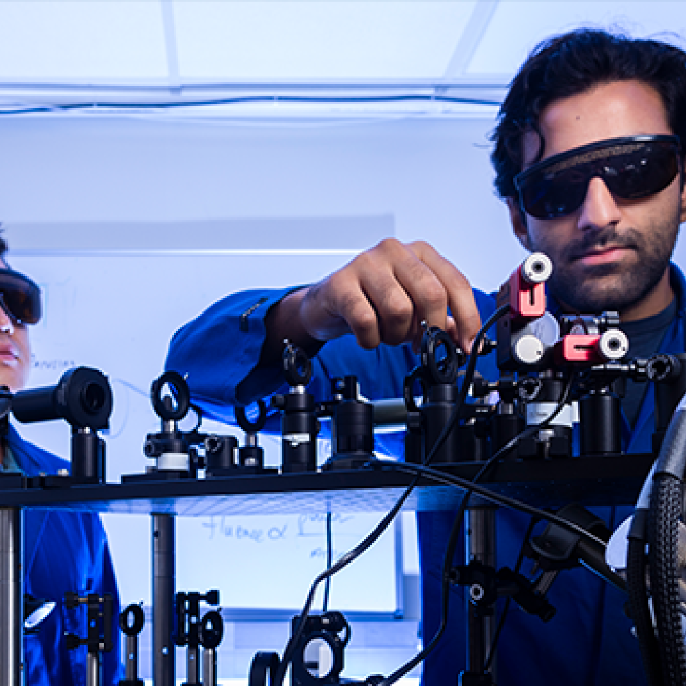 Two UCSB students working in an engineering lab