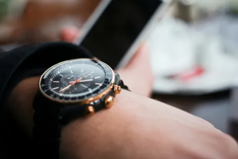 stock photo of a person's wrist with a luxury watch on it