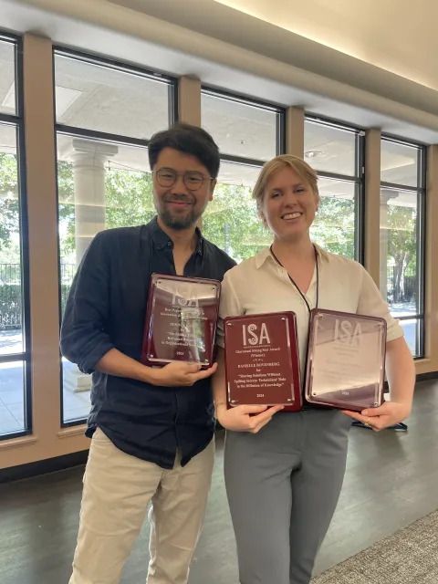 Sukhun Kang and Danielle Bovenberg with their awards